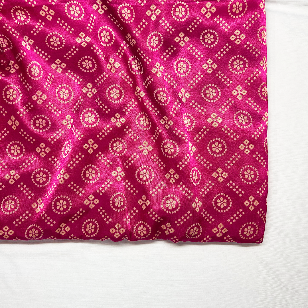 Hot pink Mashru silk fabric with golden Patola print detail