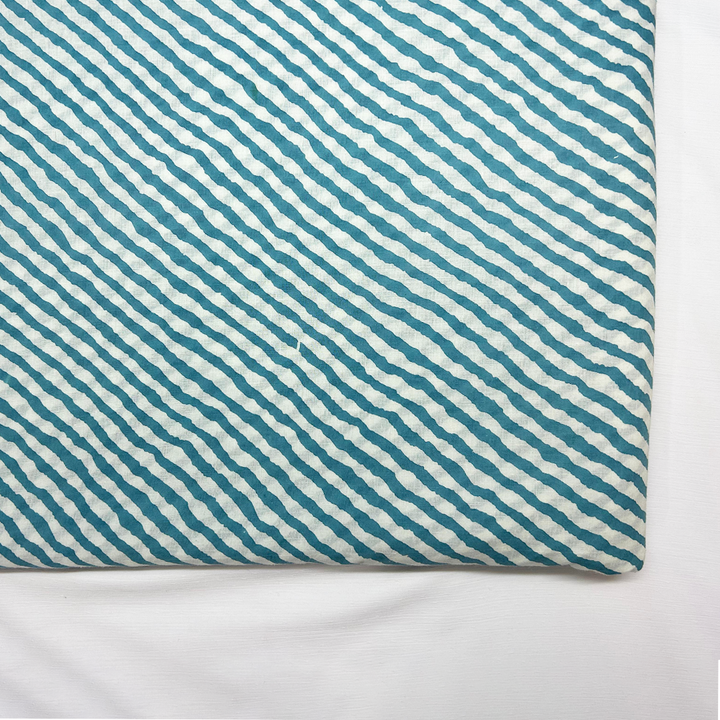 Light blue cotton with white stripes close-up