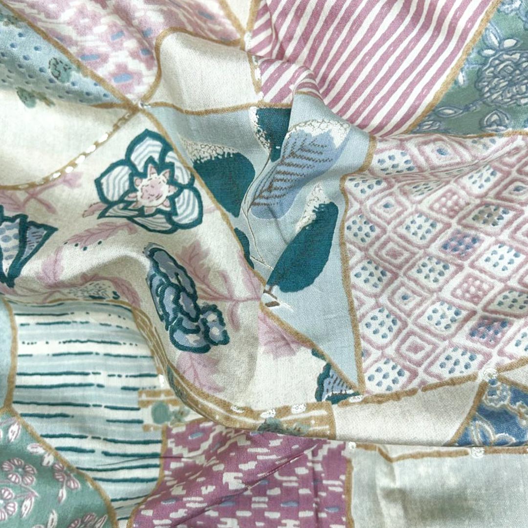 Stunning multi-shade floral printed Chanderi foil fabric, blending elegance with a touch of shimmer for sophisticated apparel.