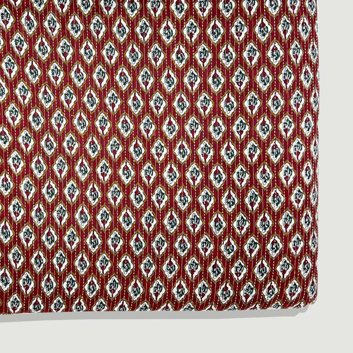 Traditional maroon shade floral cotton Kantha fabric, exuding cultural richness and artisanal charm for bespoke clothing.