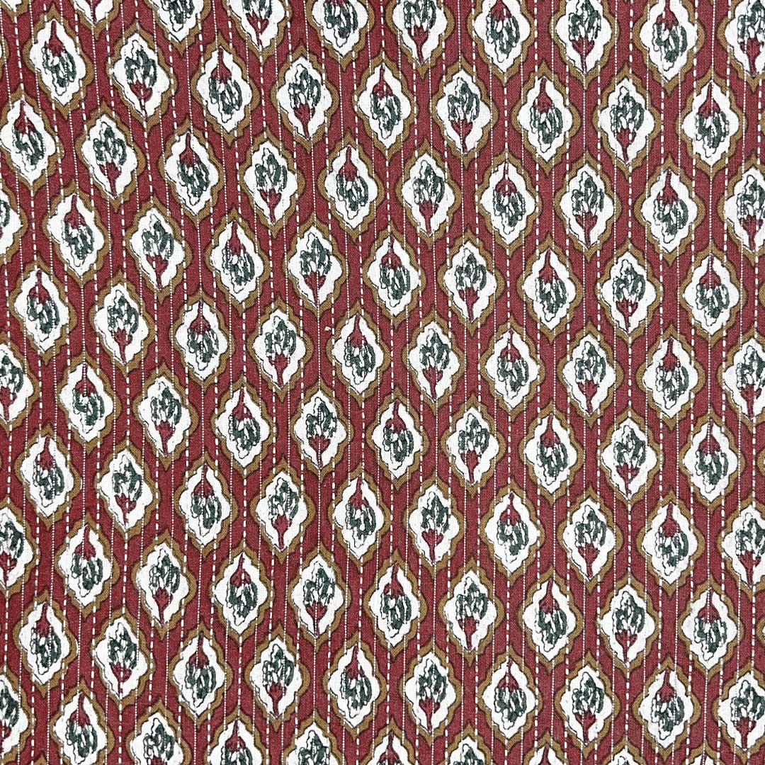 Traditional maroon shade floral cotton Kantha fabric, exuding cultural richness and artisanal charm for bespoke clothing.