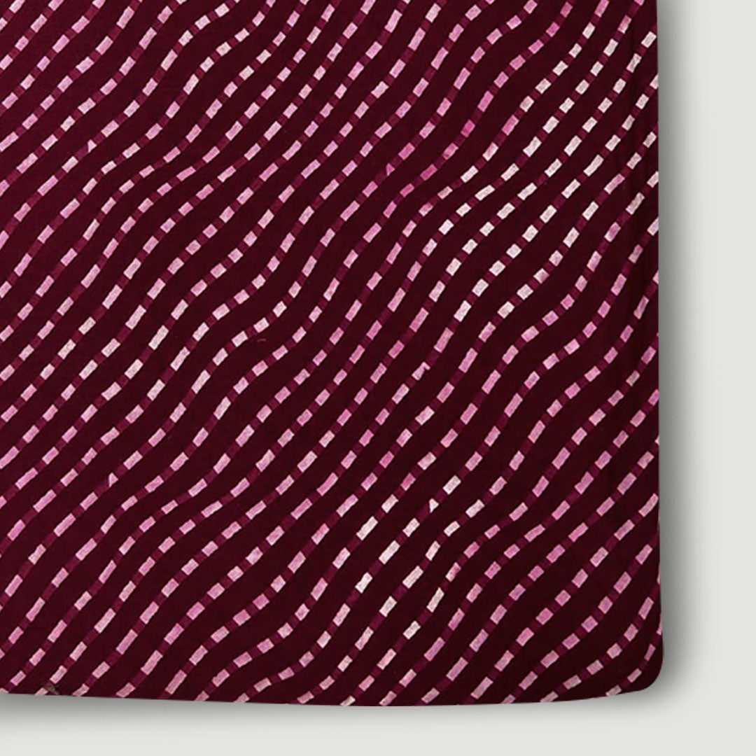 Classic maroon with white stripe pattern on soft cotton fabric, ideal for creating stylish and comfortable clothing.