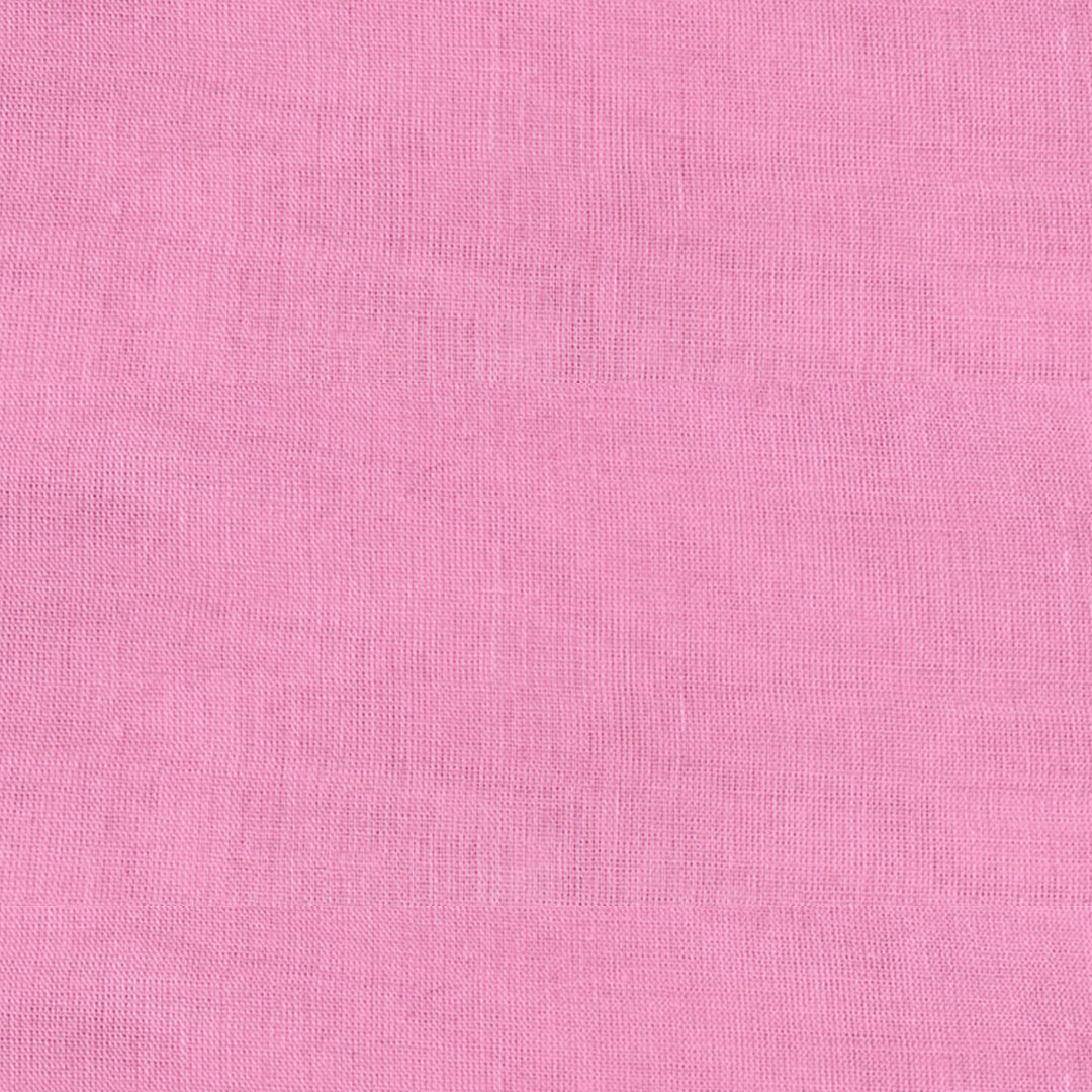 Bright neon pink Mul Mul cotton fabric, smooth and airy, perfect for comfortable and stylish garments at Fabrics @StudioLCX.