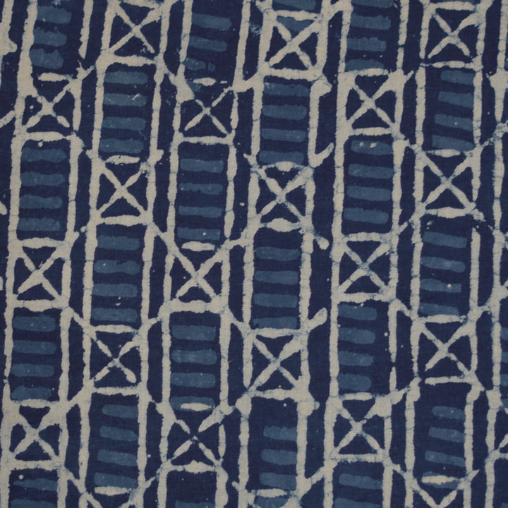 Handblock printed geometric patterns in blue and white on Dabu cotton fabric