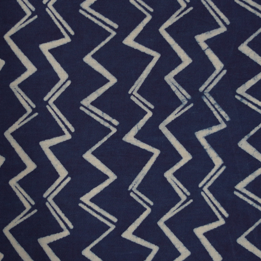 Handcrafted blue and white chevron pattern on Dabu cotton fabric