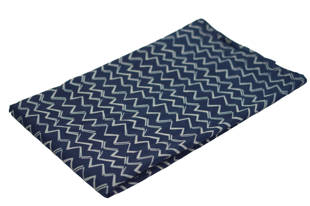 Handcrafted blue and white chevron pattern on Dabu cotton fabric