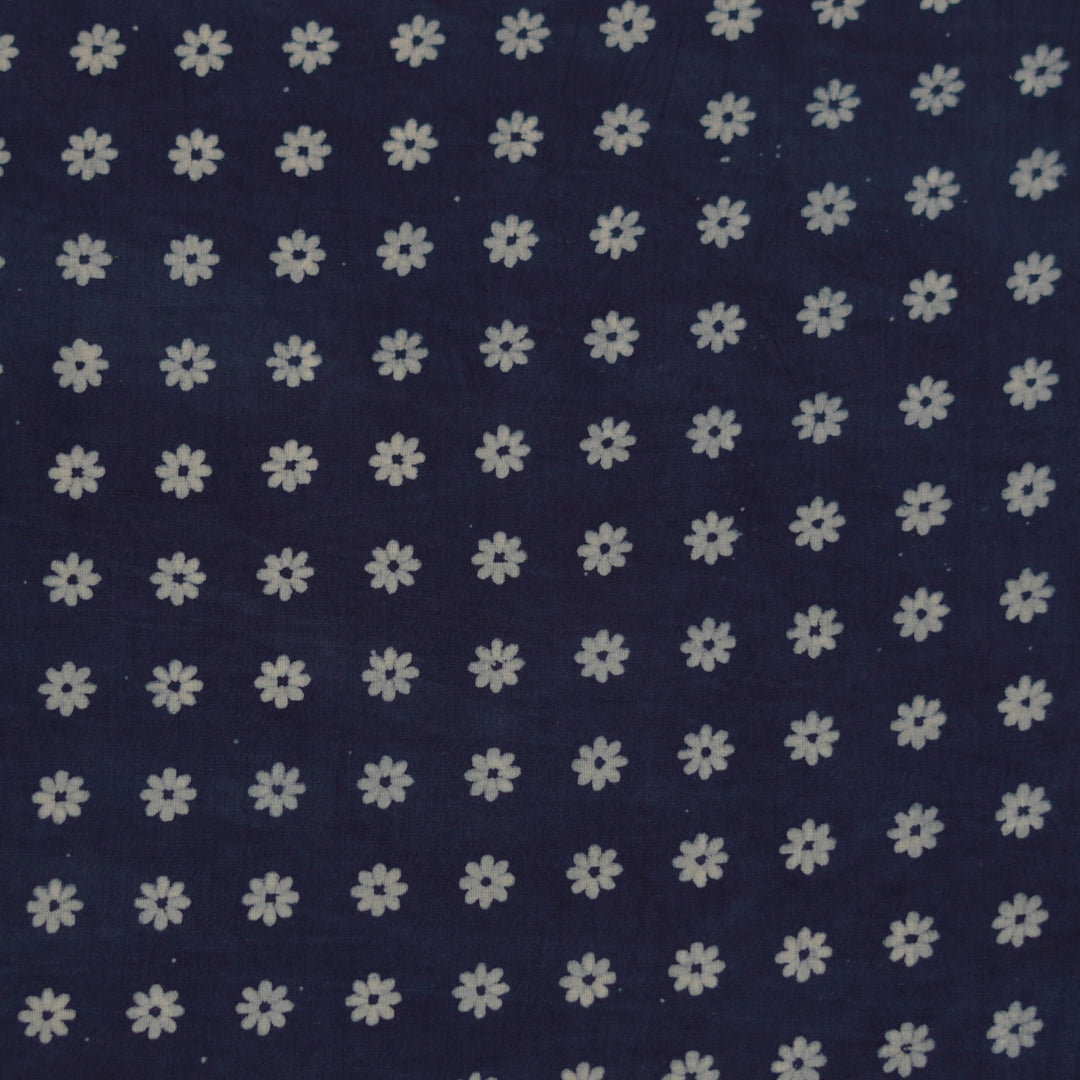 Navy blue Dabu cotton fabric with delicate white tiny floral print