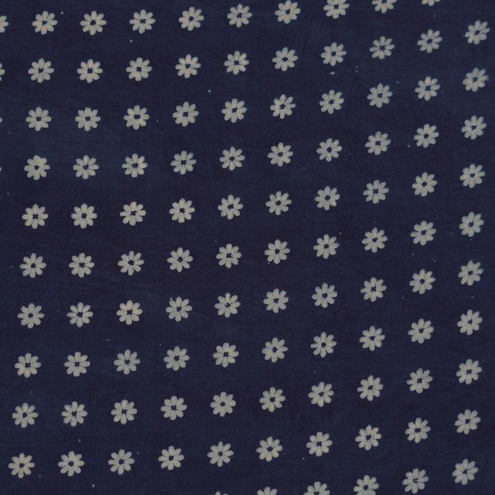 Navy blue Dabu cotton fabric with delicate white tiny floral print