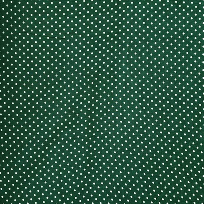 Light georgette fabric in green with playful white dot print