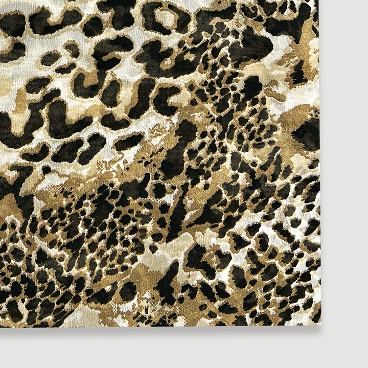  Exotic animal print on black, brown, and cream georgette fabric