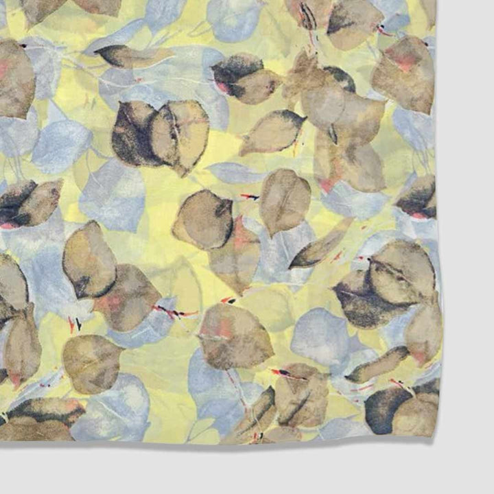 Light Yellow With Brown, Blue Leaf Printed Georgette Fabric