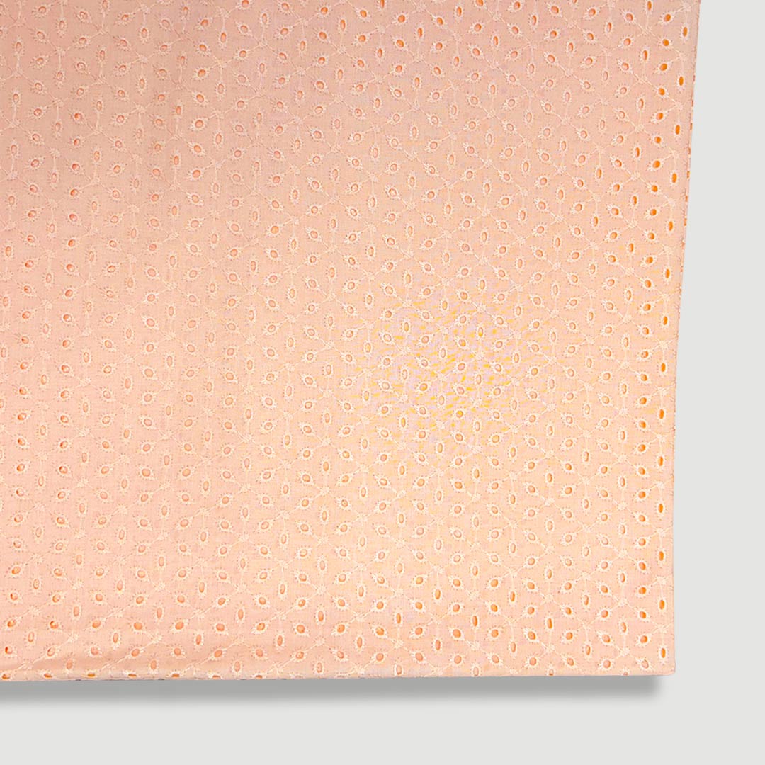 Light peach embroidered Hakoba cotton fabric detail.