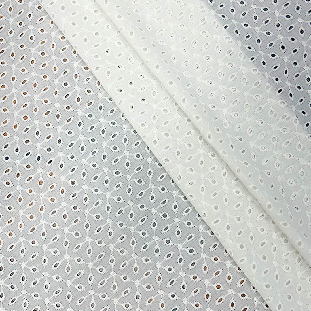 Exquisite off-white cotton Hakoba fabric with detailed embroidery, perfect for elegant and breathable designs at Fabrics @StudioLCX.