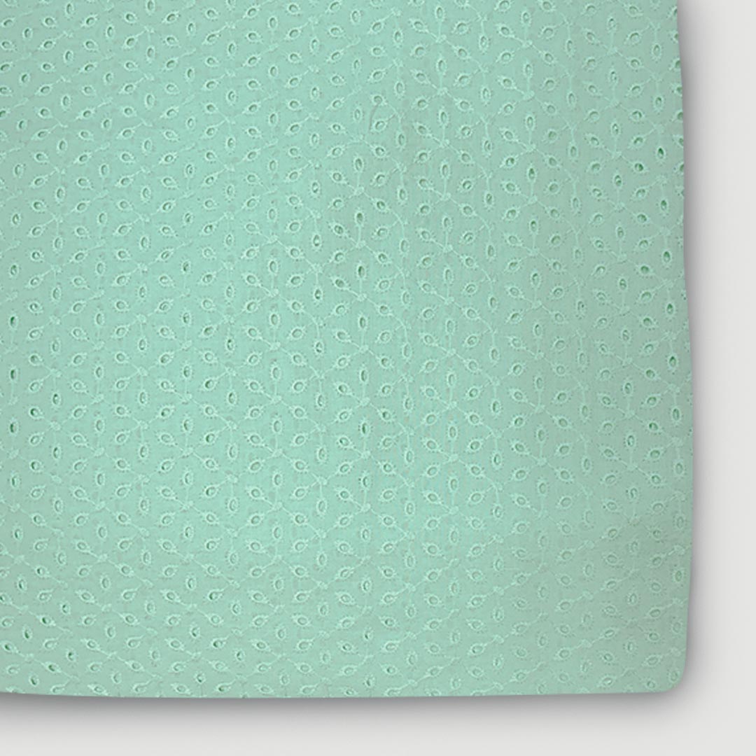 Light sea green cotton hakoba fabric with delicate embroidery, ideal for sophisticated and timeless fashion designs.