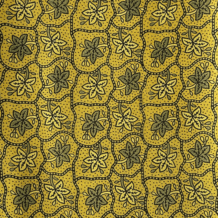 Traditional Ajrakh pattern in golden and black on luxurious Mashru silk fabric