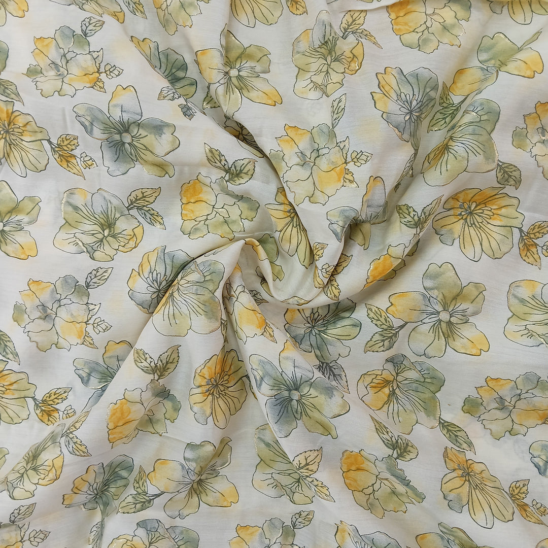 Spring-inspired soft muslin fabric with delicate yellow floral print