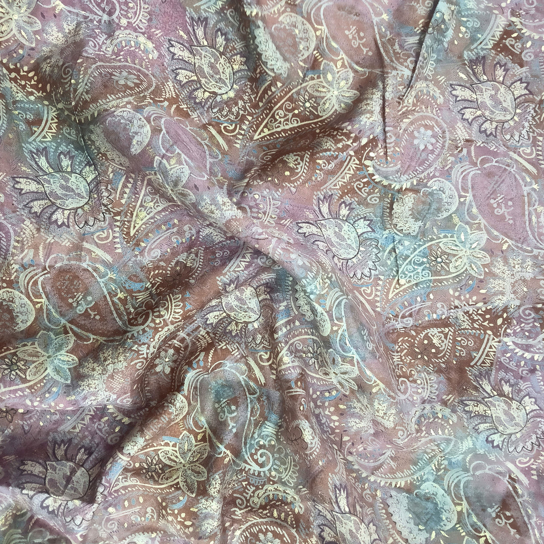 Colorful multi paisley patterns on muslin fabric, blending traditional elegance with modern style for unique garment creations.