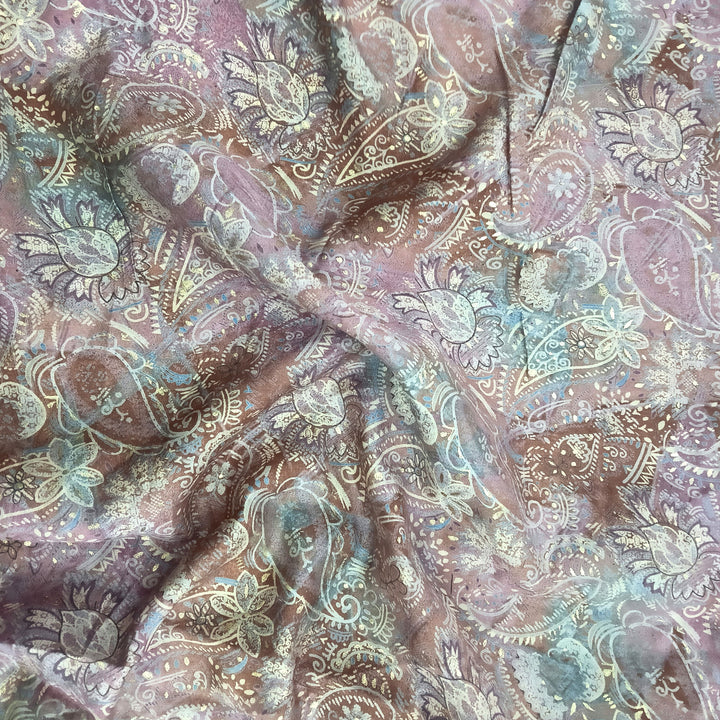 Colorful multi paisley patterns on muslin fabric, blending traditional elegance with modern style for unique garment creations.