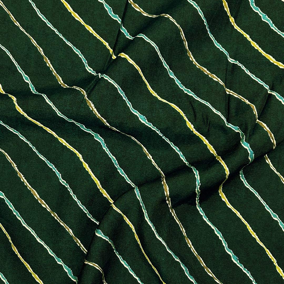 Luminous dark peacock green muslin fabric with leheriya wave patterns and gold accents