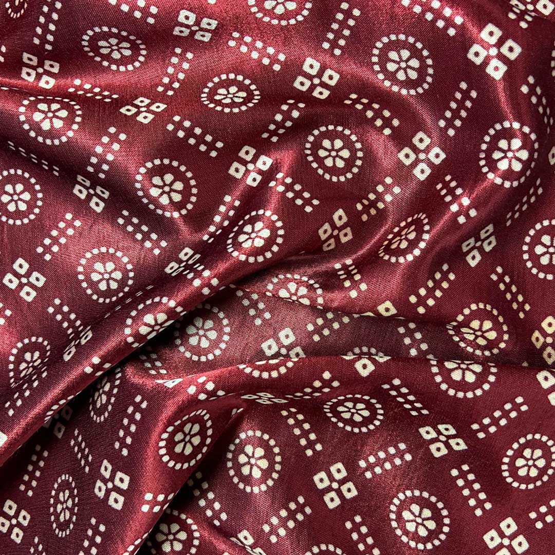 Elegant maroon Patola printed on lush Mashru silk fabric, perfect for creating luxurious and culturally rich garments.