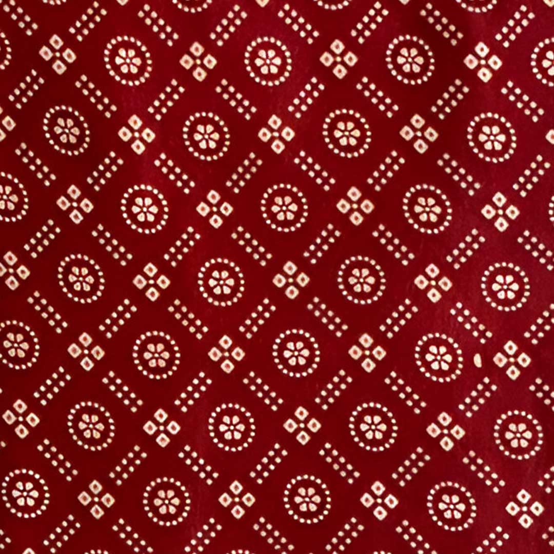 Elegant maroon Patola printed on lush Mashru silk fabric, perfect for creating luxurious and culturally rich garments.