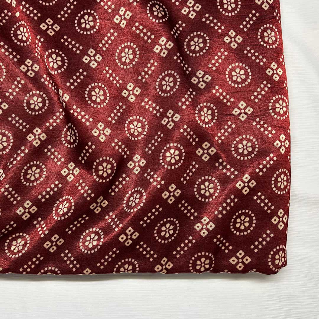 Elegant maroon Patola printed on lush Mashru silk fabric, perfect for creating luxurious and culturally rich garments.