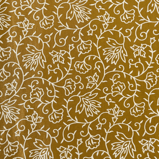 Opulent golden Mashru silk fabric featuring intricate cream floral prints