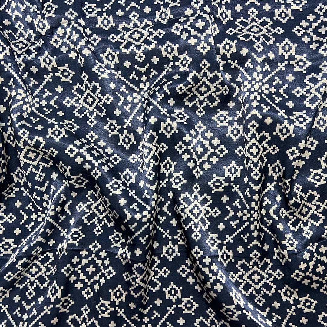 Elegant navy blue Patola printed Mashru silk fabric with intricate designs for luxurious sewing projects at StudioLCX.