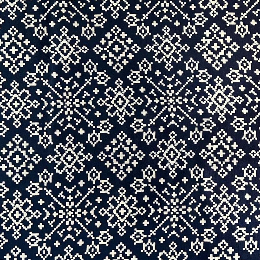 Elegant navy blue Patola printed Mashru silk fabric with intricate designs for luxurious sewing projects at StudioLCX.